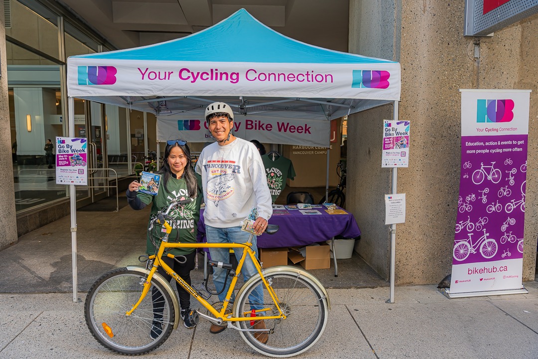 A couple in front of HUB info stand