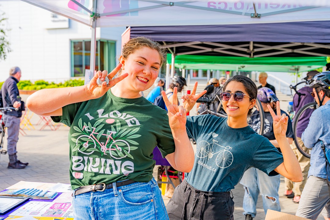 Two cycling enthusiast HUB volunteers