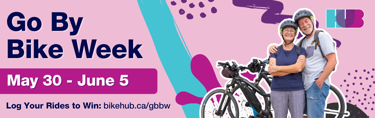 HUB Go by Bike Week banner. An elderly couple smiles while they stand beside their bikes.