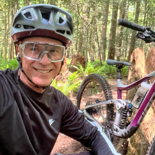 A photo of Antonio Arciniega with his mountain bike.
