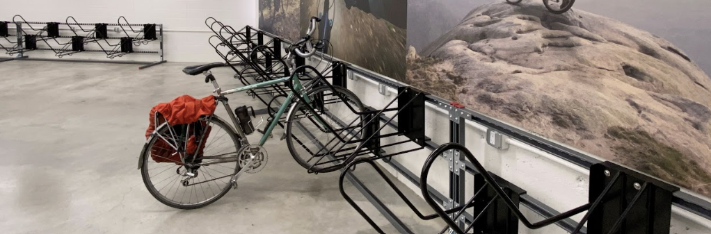 A bike is parked in a bike parking room.