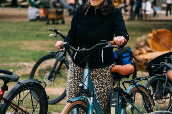 A senior woman with her bike