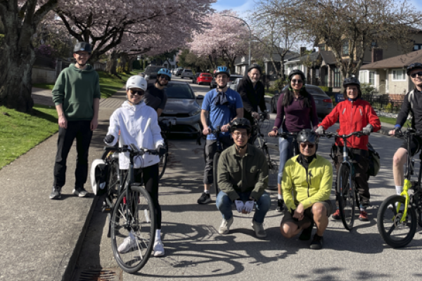 A group of people with their bikes on a group ride