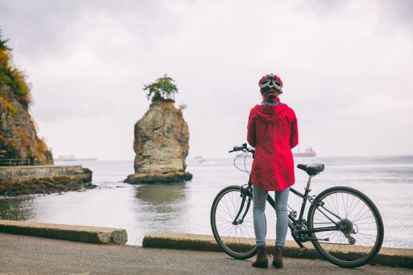 Bicyclist Looking Over Water