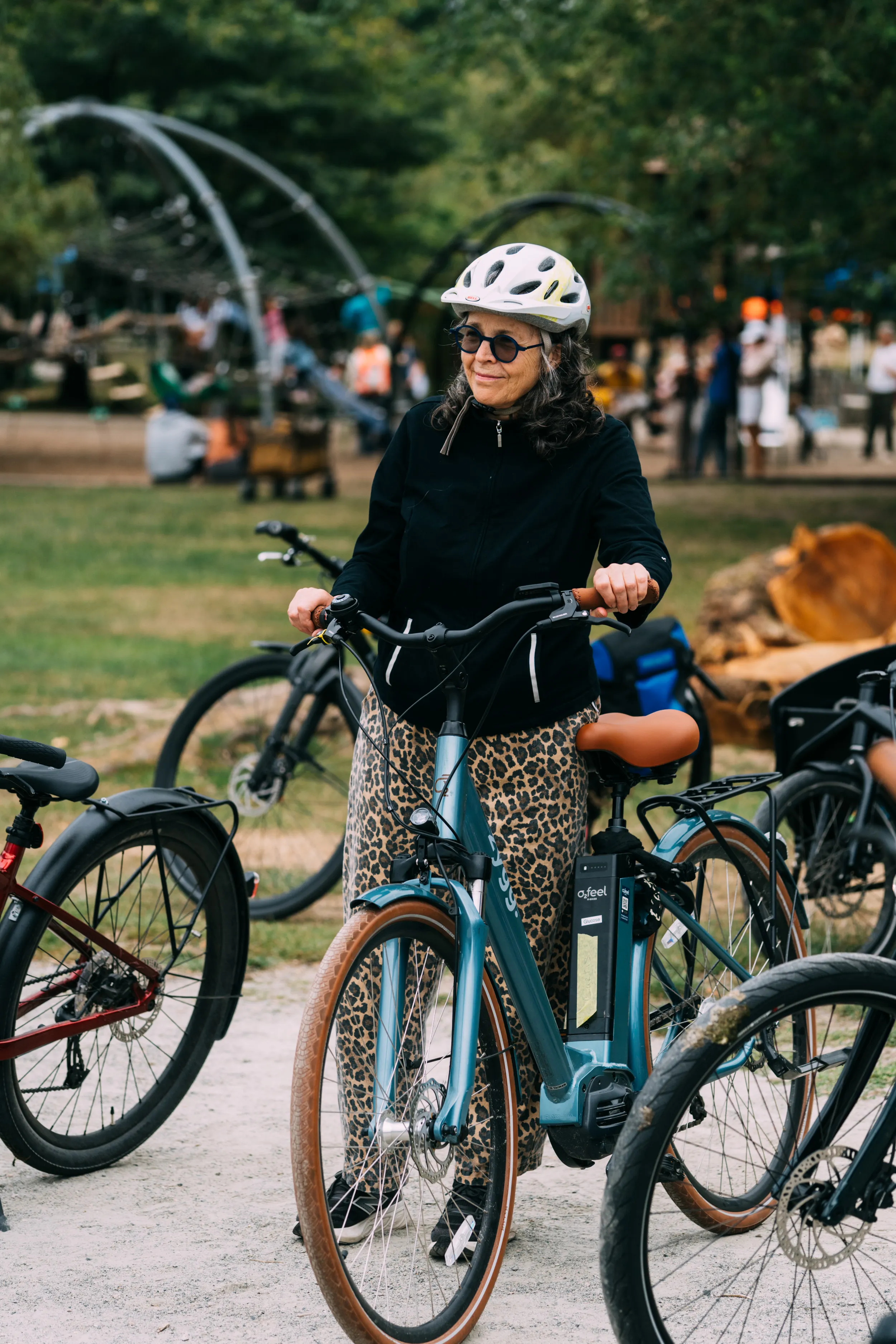 A senior woman with her bike