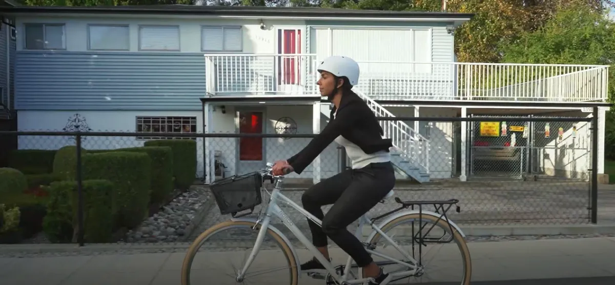 A woman rides her bike in Surrey.
