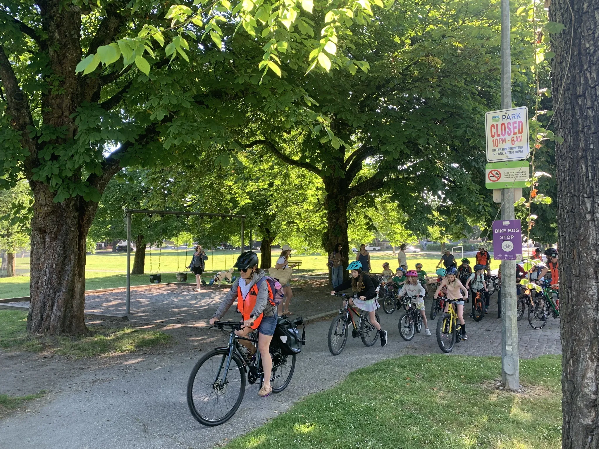 Kids riding in the park.
